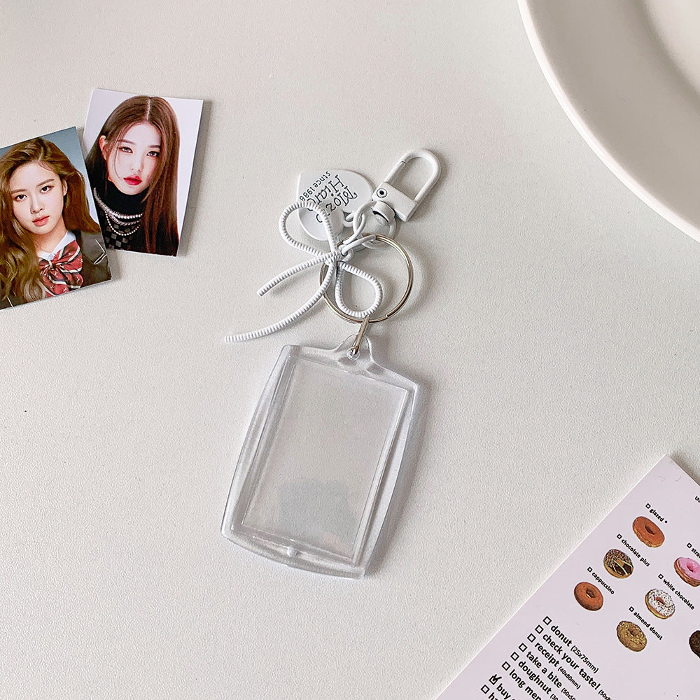 Transparent acrylic love bow keychain pendant can be placed, ID photo, big head sticker, photo frame, star chasing pendant, female.