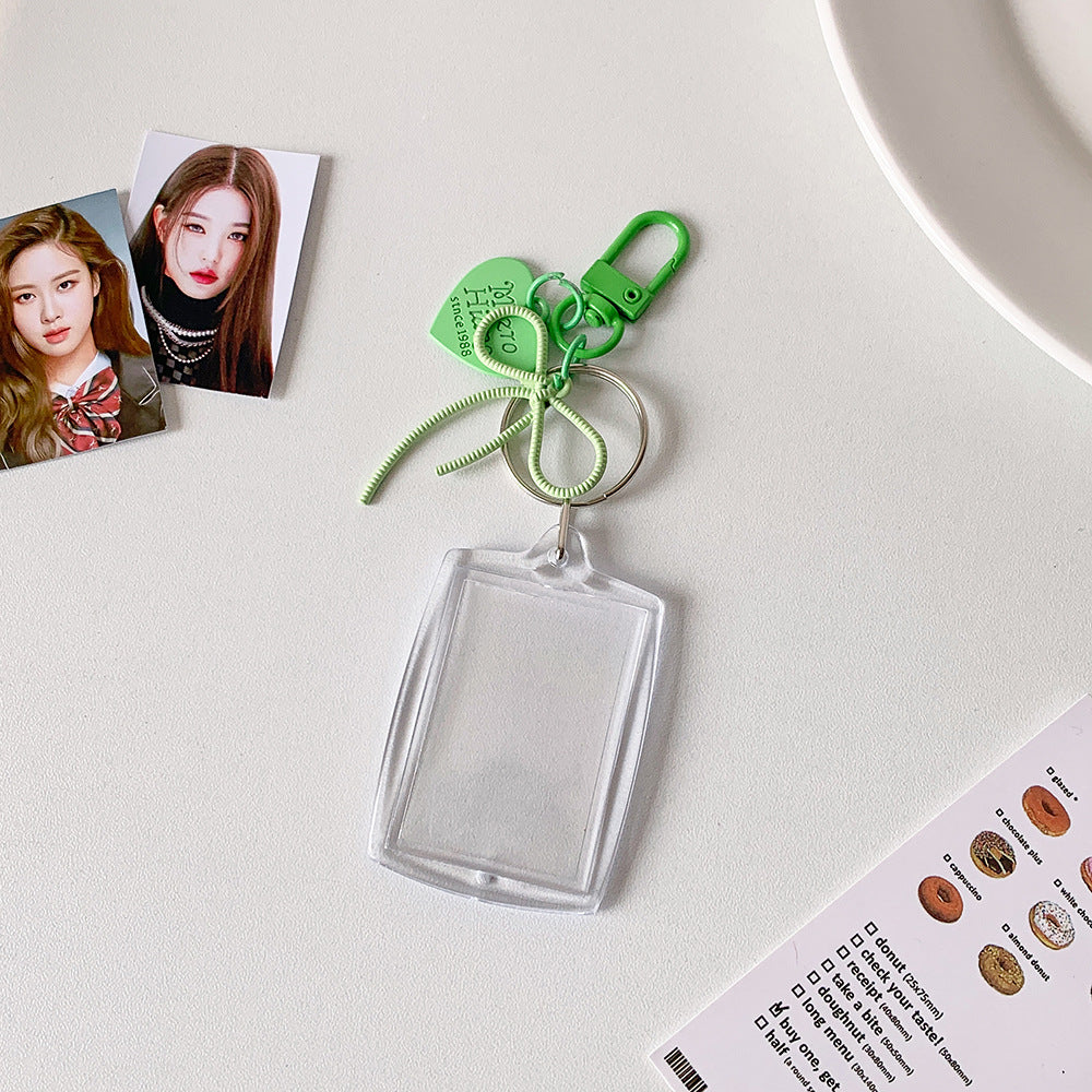 Transparent acrylic love bow keychain pendant can be placed, ID photo, big head sticker, photo frame, star chasing pendant, female.