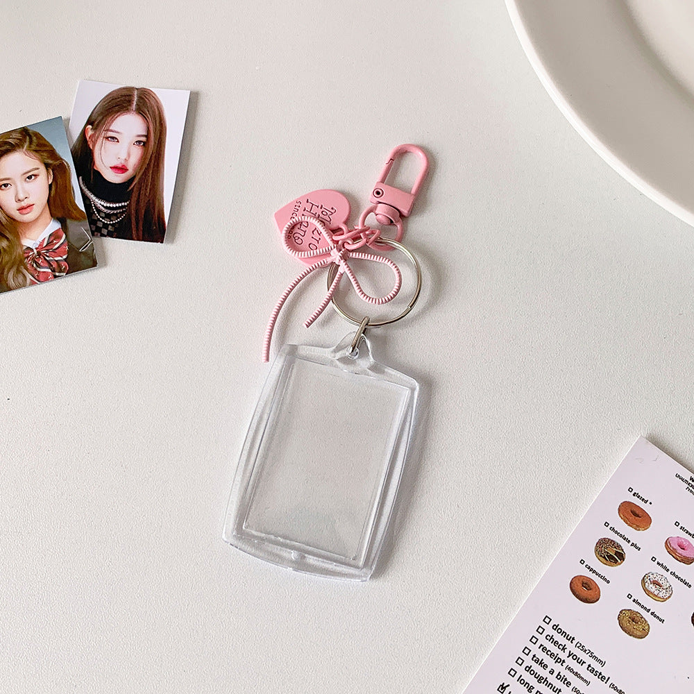 Transparent acrylic love bow keychain pendant can be placed, ID photo, big head sticker, photo frame, star chasing pendant, female.