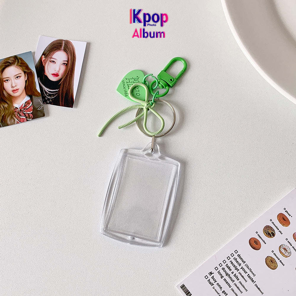 Transparent acrylic love bow keychain pendant can be placed, ID photo, big head sticker, photo frame, star chasing pendant, female.